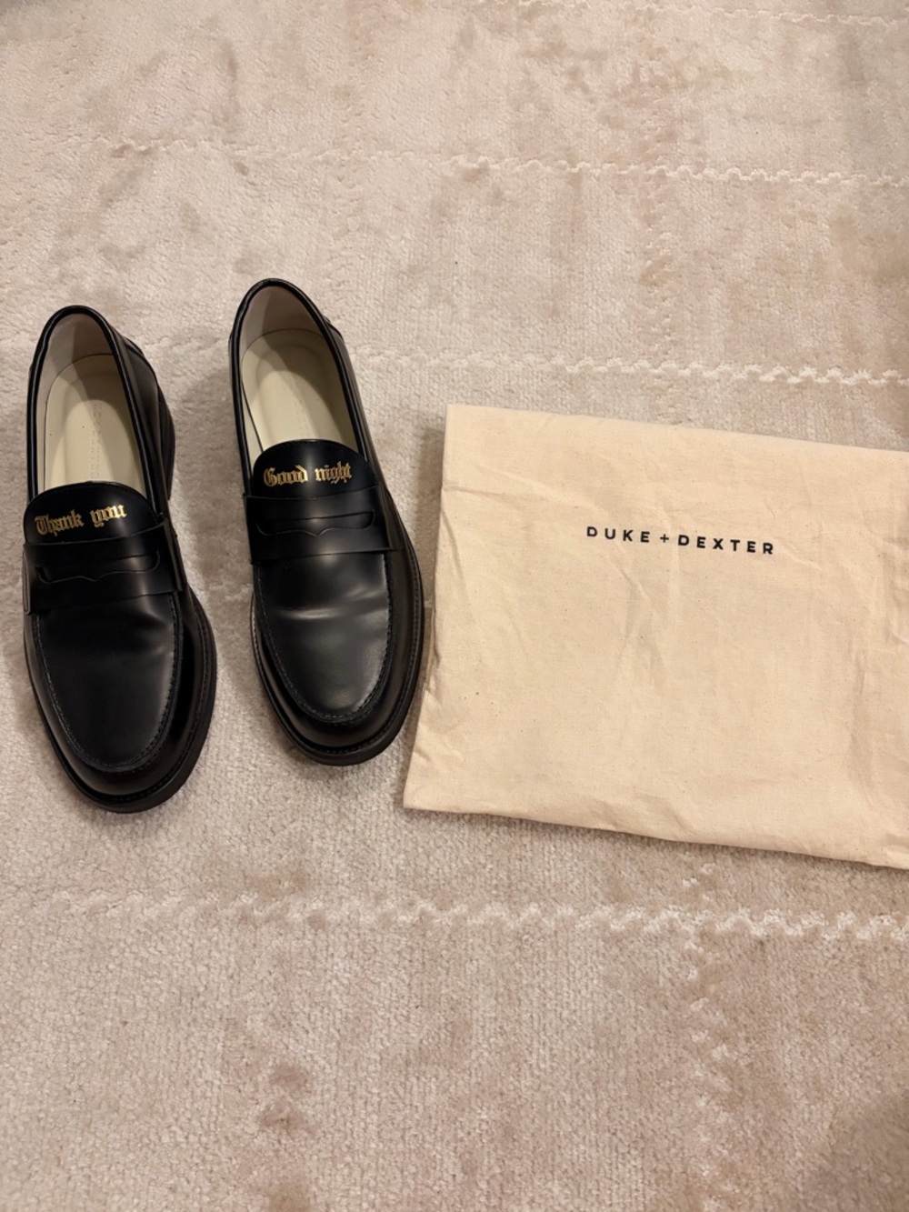 Duke + Dexter Black Leather Penny Loafers with Gold Script